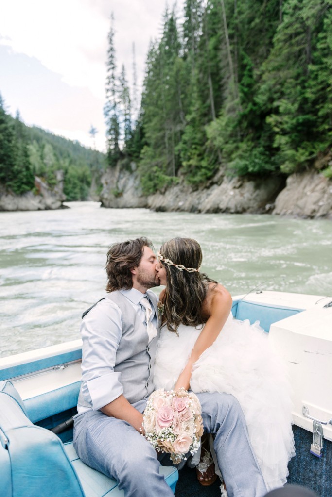 Couple kissing at Kinbasket lake wedding photos