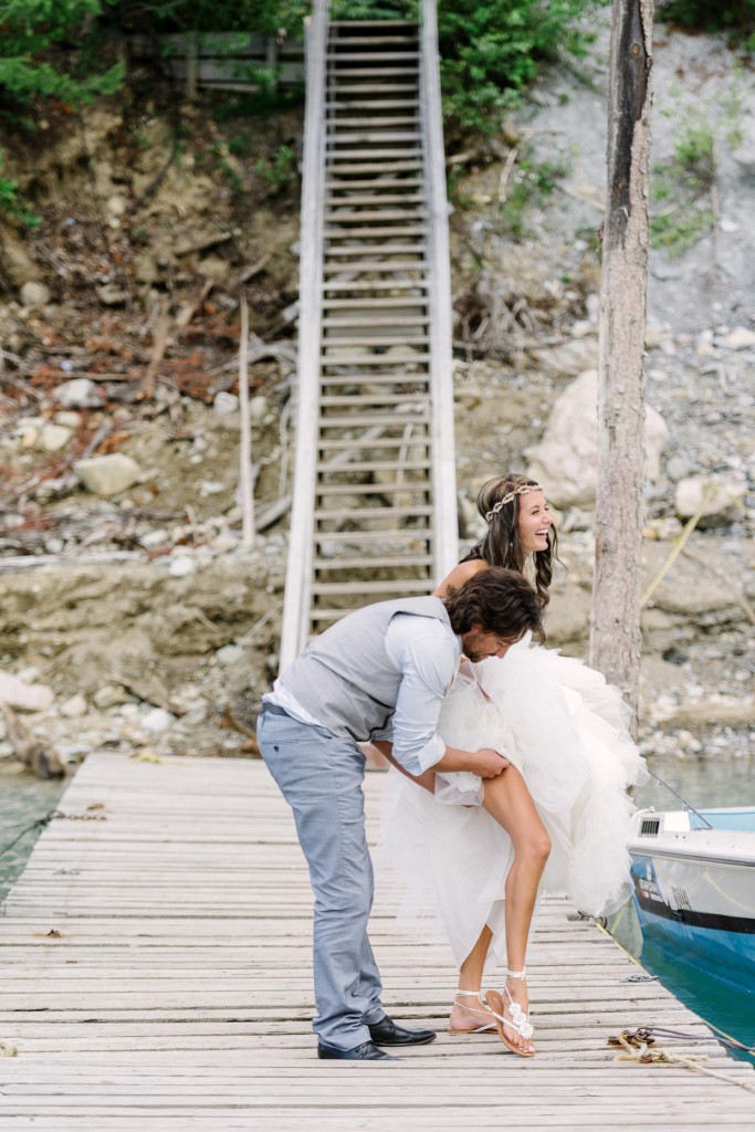 Fun moment between bride and groom at kinbasket lake resort golden bc photos