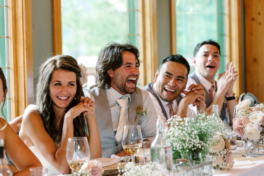 Bride and groom reacts to fun speech Golden BC wedding photos