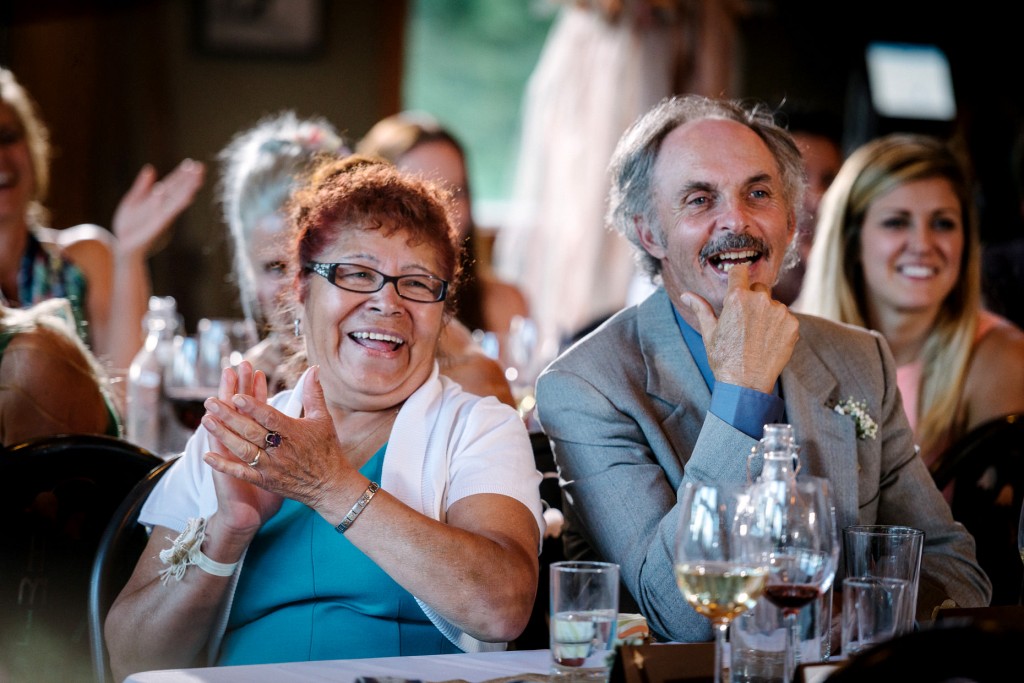 Groom's parents celebrating during this Heather Mountain Lodge Wedding