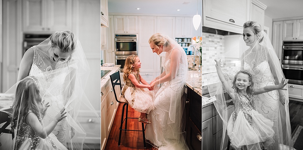 bride-dancing-with-flower-girl-in-kitchen